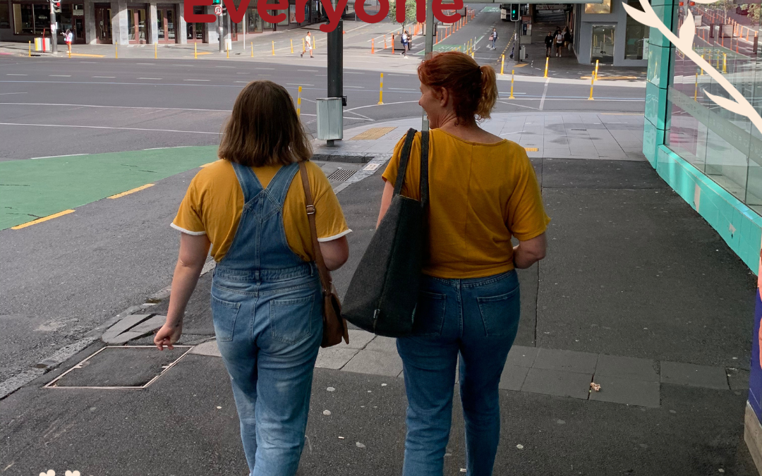 Mother and daughter walking and talking